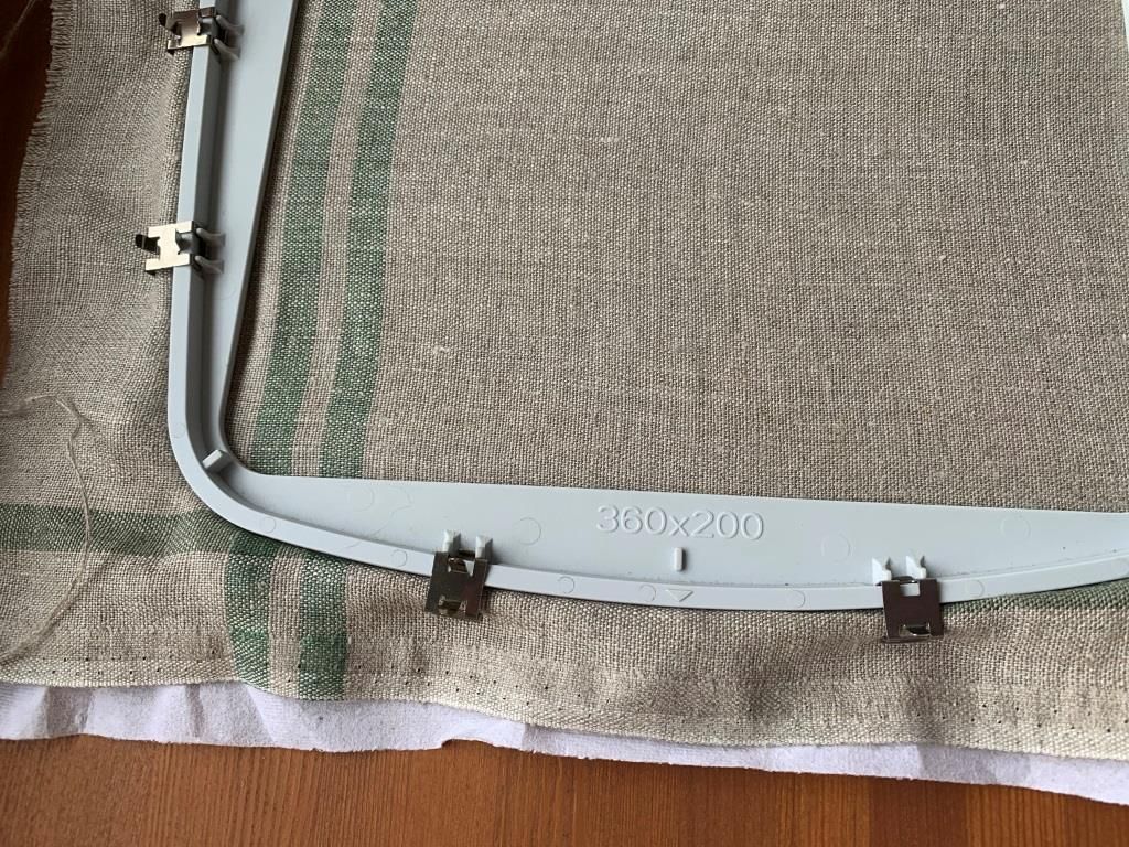Fabric and stabilizer hooped for Photo Stitch embroidery