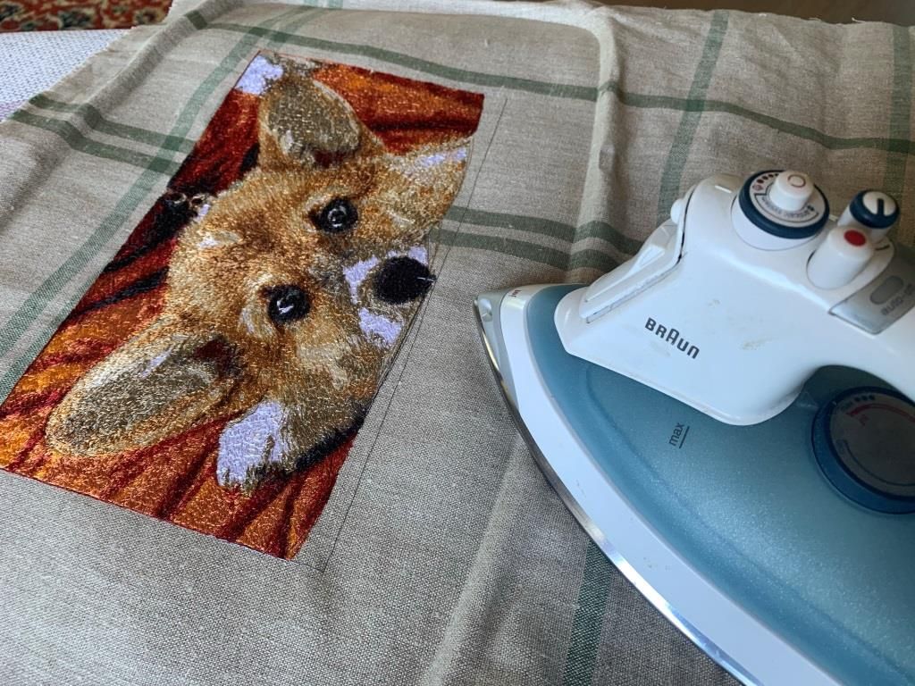 Removing the excess stabilizer and pressing the embroidery
